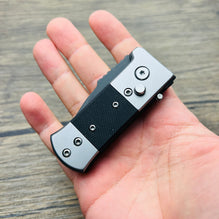 mini switchblade with push button